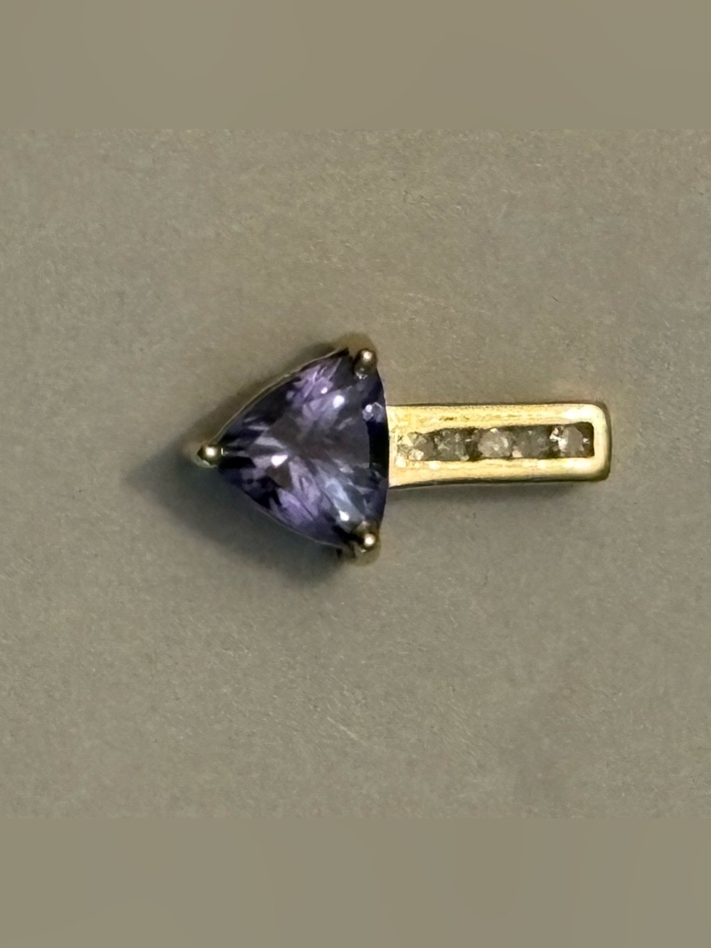 10k yellow gold Pretty trillion darker tanzanite with diamonds